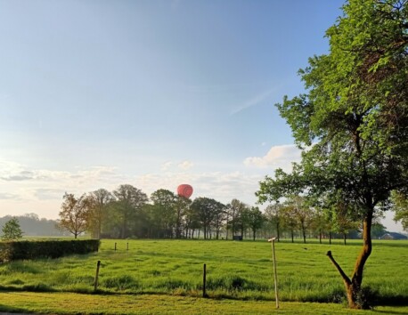 Green space with blue sky farm-camping-the-katreel